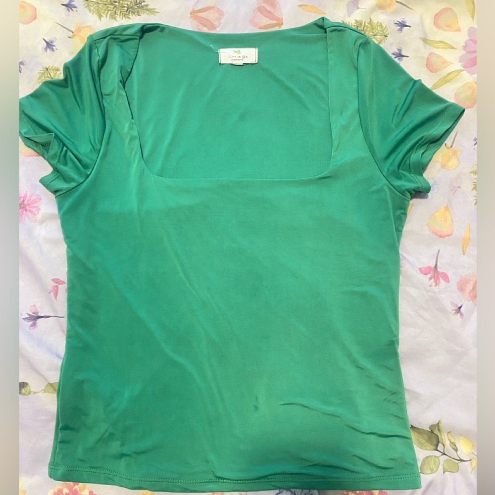 green silky shirt